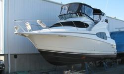 2001 Silverton 330 SportBridge, this 330 SportBridge is covered by a MerCruiser powertrain warranty through 2014. This boat is in showroom condition and needs nothing. Power is by MerCruiser 8.1 Horizon 370 HP. All New Canvas. There are no surprises on