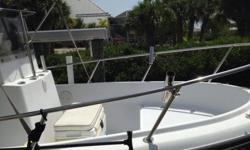 17' Boston Whaler Outrage 1996, center console 150 Evinrude direct fuel injection, trailer, bimini, full cover, helm and seat cover, full cushion package, GPS/Depth finder, bait well, excellent condition. $12,500, Lift kept. Great Unsinkable Fishing