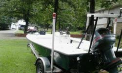 great condtion and under 100 orig hrs......boat is immaculate and ready to bass fish or flats fish or you could even bow fish with it comes with 36volt tm ,trim tabs ,pushpole , undergunnel lighting, new waterpump, compression all even at 125lb! trailer