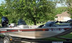 16.5 foot 2013 Bass Tracker, Boat was bought new in Sept. of 2012 at the Bass Pro Shop and has been garage Kept. Motor 50HP with Power Trim--only has 6 hrs. on it, runs straight gas, Live Well--Storage Areas-- Trolling Motor-- Depth Finder-- Boat Cover