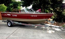 For sale Lund Aluminum fishing sport boat - 21'Powered by 5.7LLength: 21'Trailer w/breaks Fuel Tank 1 (about 80 Gallons)Bimini topRod holders 1RF18561351031988 Auto/manual pump live well's for fish (2). Lowrance Fish finderJust serviced engine, oil, and