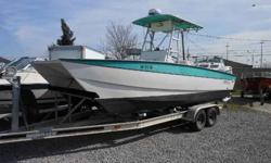 The Boat Yard Inc. Sabre Cat 22 with 2 Johnson115hp Ask for Will for questions and information:96' Sabre Cat with twin Johnson 115hp Engines. Furuno 12mi radar, T-Top, Leaning post, aluminum trailer, 100 gallon fuel cell, call "Will"504-340-3175 or email