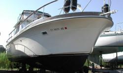 This 1969 35 ft Owens Concorde Fly Bridge Sedan with extended cabin, repowered with Marine Power 454s, is located out of the water in Clinton, CT, and a perfect project boat for a live aboard. A dose of sweat equity and splash her for a classic Flybidge