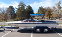 PRICE JUST REDUCED TO $6,500!
Ford 460 cid, V8 engine, aprx 250 hours; Berkley jet drive;
Fotogenics 2-axle trailer w/surge brakes & custom rims;
Bimini;
Full storage cover;
Swim step;
Ski, anchor, & safety gear storage in bow;
Cooler;
(2) 30-gallon