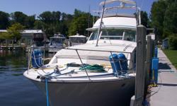 This traditional flush deck motor yacht is in good condition for her age. She was prized for a quality build, great ride comfort and lasting popularity. She offers excellent visibility from her lower helm and a well designed interior. She will make a