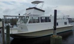 (LOCATION: Wanchese NC) The 47 Aquahome by Chris-Craft is a houseboat designed for weekend getaways with room to live aboard.&nbsp;She comes with tons of deck space and a spacious two stateroom interior. There&rsquo;s space for everyone and everything.
On