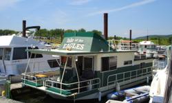 Detailed Description:
This houseboat named Isle of the Eagle is in well above average condition for a 1982 boat. The present owner has spent a great deal of money eliminating problems other houseboats of this vintage have. In 2003 the bottom was
