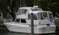 Fresh water since new.&nbsp; Sold new here in Michigan. Mint condition!! 6-71TI 450HP Detroit Diesels. 500 hours on major overhaul. GPS Plotter, Radar, Pilot, Vacuflush heads, Full canvas. Complete new interior and fabrics.&nbsp; New canvas. Call listing