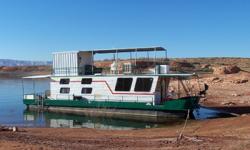 THIS IS A 1/4th MULTI-OWNERSHIP PONTOON HOUSEBOAT.
(1) Share available:
(1) Week per month, annually: May thru October.
Monthly maintenance fee: between $160 - $270.
Twin 1995 Mercury 90 hp, 2-stroke outboards, aprx 550
hours
New electric converter system