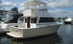 A WHOLE LOT OF UPDATES MAKE THIS PARTICULAR EGG HARBOR A STUNNING GEM!!
TEAK WOOD INTERIOR, METICULOUSLY DONE. 2 STATEROOMS (V-Berth Converts to Double - Forward & 2 Bunk Guest Room - Starboard). STAND-UP HEAD, NEW WINDOW COVERINGS, WINDOWS TINTED, NEWER