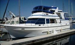 Accommodations & LayoutThe 42 Present is a comfortable sundeck motoryacht featuring two staterooms galley down plus a dinette that converts to sleep two. The Master is located aft with a centerline queen berth and the Guest Stateroom is forward with a