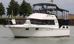 Very popular, practical design. Two private staterooms, two heads, packs a lot of living into a 32 ft Motoryacht. Lower helm offers all weather boating. This is a well maintained boat. Trades ConsideredACCESSORY ANCHOR W/LINES CABIN AIR CONDITIONER -