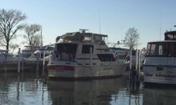 Well maintained 44 foot Motor Yacht with ample sleeping arrangements and entertainment options. Two staterooms with enclosed heads, a full galley, and salon complete the cabin area. The fly bridge is complete with a double wide helm seat, full