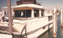 Great Family boat makes perfect water cottage with all the comforts of home.
Nominal Length: 36'
Length Overall: 36.8'
Max Draft: 2.5'
Draft: 2 ft. 6 in.
Beam: 12 ft. 0 in.
Fuel tank capacity: 142
Water tank capacity: 40