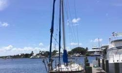 (LOCATION: Stuart FL) The Lord Nelson 35 is a cutter rig cruiser with a fresh-water-cooled Yanmar diesel engine. She features a large open cockpit with cushioned seating and bimini top.
The spacious interior provides upscale accommodations with two