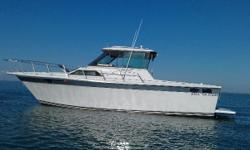 Repowered with twin 2006 Marine Power EFI 350 horsepower engines with all 4 exhaust risers just replaced.
New helm is only 1 year old. Engine sync gauge and all new Faria gauges.
Newly upholstered seats inside and out. New curtains inside, as well as