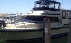 A very spacious double cabin design featuring light teak interior, bright, large, main salon, and low hours on twin Cat 3208 diesels. This well-kept yacht has many upgrades including new Garmin instruments. The excellent, open, airy main salon has a queen