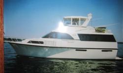 Vessel WalkthroughSatisfied has been upgraded and well cared for by her knowledgeable owner. With 3 staterooms and 3 heads the 48 Ocean will provide abundant live aboard room.SalonFull bean Salon with dining area aft of Galley with table and chairs.