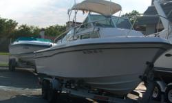 This 1991 Grady White 20' Overnighter is powered by a 1996 Yamaha 200hp motor. features include: full canvas, dual batteries, depth finder, and a dual axel trailer is included for free. This boat has all the original cushions that were stored inside and