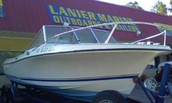 Se all the pics www.LanierMarine.com
The Step-Lift v-20 has a legendary dry and smooth ride. Powered by both a Yamaha 225 and a 9.9 Yamaha 4 stroke with lots of torque. It is rigged so that you can copletely control the electric start reliable kicker from