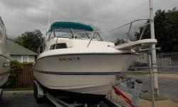 This 1993 26 Renken Seamaster walk around is powered by 5.7 engine 260hp. Features include: enclosed head, pressure water, dockside power, fresh water wash down, bimini top, bow pulpit, live well, full swim platform, trim tabs, dual batteries, compass,