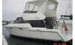 This 1993 Carver 37 in Stamford CT is set up and ready to go.
Sleep 7 people in 4 berths in 3 cabins on this Carver 37. Below: the owner's stateroom with a double berth and a shower stall head is forward. Double stateroom to port, roomy head to Starboard.
