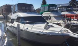 Always freshwater, less than 700 hours, two year old canvas. This two stateroom boat has a lot to offer, plenty of room on the bridge allows company for the captain, and the lower helm lets you run in inclimate weather. Trades considered CANVAS BIMINI TOP