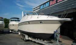 This 1994 Maxum 2700 SCR is powered by a single 7.4 liter Mercruiser and a Bravo 2 outdrive. Features include: trim tabs, full canvas just replaced this month, sleeps six, enclosed head with shower, dual batteries, refrigerator - both ac and dc, dockside