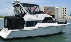 Enter OVERDRAFT through the transom door onto the spacious rear deck. Up you will find the Flybridge with comfortable seating for 6, new custom upholstery, new custom captains chairs, wood grain dash, new gauge package, new complete Sunbrella fade proof