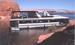 THIS IS A 1/8TH MULTI-OWNERSHIP HOUSEBOAT!
Twin MerCruiser 350 cid engines w/Bravo II sterndrives;
Mathers Micro Commander electronic controls; Aluminum V-hull construction; Oil changing kit w/pump for (3) engines; Bow & stern hydraulic side thrusters;