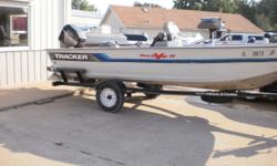 1995 Tracker Pro Deep V 17 with a 75 hp Mercury. The boat has a steering console, a 70# Minnikota Power Drive trolling motor with auto pilot, a 25# anchormate, a Hummingbird 300 TX fish finder at the helm, a Garmin 240 on the bow, rod lockers, live well,