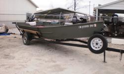 1996 AAD 20' skiff custom plate boat on a heavy built trailer with a 2006 90hp Evinrude E-Tec. The boat is 20' long with a 54" bottom and an 82" beam. It has an aluminum floor with spray in liner, splash guards welded on the stern, one rear storage seat