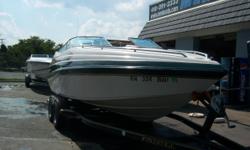 This 1997 Crownline 225 cuddy cabin is powered by a 7.4 Mercruiser with a bravo3 outdrive. This is an optional package from Crownline. The boat also has silent choice thru transom exhaust. Features include: depth finder, cockpit cover, bimini top, dual