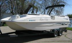 1997 Rinker Flotilla 24 This is a 1997 24' Rinker Flotilla deckboat with a 5.7 L Alpha (210 h.p.) Mercruiser engine and a 1997 Trailmaster custom tandem axle trailer.The boat is white and green with a porta-pottie, snap-in carpet, AM-FM CD player stereo,