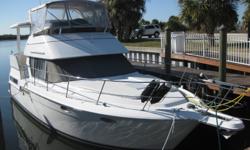 This classic Carver 355 is a beautiful floating condo with enough space and amenities to keep a family very comfortable. One engine has been completely rebuilt and only has 40 hours on it (3 year warranty) and the other has 700 hours and has been well