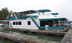 Big roomy 16 x 67 houseboat with full top cover. &nbsp;4 sleeping berths, two queens, two cuddy's. &nbsp;Central heat and air, split bath with shower. &nbsp;Fully equipped kitchen, new laminate hardwood flooring, updated decor, new MMC controls, two 5.7