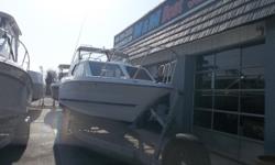 This 1998 Bayliner 2452 Hardtop is powered by a 5.0 liter 230hp Mercruiser engine. Features include: dockside power, refrigerator/freezer, dual burner stove, dual batteries, enclosed head, pressure water; loaded with many options. This huge 24 footer