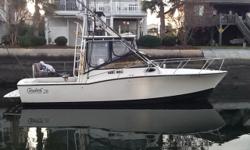 Perfect example of a Carolina fishing boat. This upgraded 1998 Carolina Classic is a lot of boat for the money. This boat is designed with the serious fisherman in mind. Spacious deck, easy access rocket launchers, and roomy fish boxes and bait wells