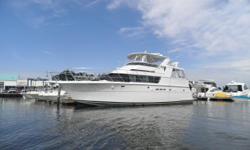 Layout and interior features
The Hat-attude 50' HatterasSport Deck offers a quality built motoryacht with lavish interior. From the spacious enclosed aft deck beautiful open salon large galley with home-sized appliances dinette two custom queen berths
