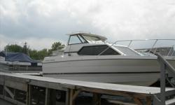 A nice cruiser with lots of fishing characteristics! This boat has lots of room in the cabin, and a cockpit designed with fishing in mind! Powered by a 220 hp Mercruiser engine and towed on a tandem axle trailer, this boat has a lot of extras, including a