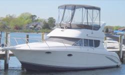 The 312 Silverton Sedan Cruiser has SPORTY PERSONALITY !! The molded-in flybridge is roomy with an L-shaped lounge. The interior sleeps six (which is extraordinary for a 30 footer) and opens to the cockpit via a sliding door. There is a transom door for