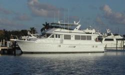Aft deck
The Aft Deck has a hardtop for shade features a table and four chairs and is surrounded by custom low height rails so that the view is undisturbed.A set of curved stairs lead down from the starboard quarter to the swim platform.There is a large