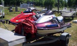 1999 KAWASAKI ULTRA 150, 2 SKI PACKAGE ON DUAL TRAILER! 1999 KAWASAKI ULTRA 150 IN RED AND 2001 KAWASAKI ULTRA 150 IN CUSTOM CAMILLION PAINT. BOTH SKIS ARE 2 SEATERS, HAVE 150 HSP EACH, AND FAST! GREAT FOR TRICKS OR JUST PLAYING IN THE WAVES. HURRY IN