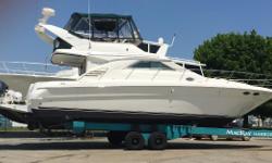 This one is special! This 1999 Sea Ray 400 Sedan Bridge is immaculate. Professionally maintained and detailed annually, she has received meticulous care. Featuring new canvas and a new swim platform in 2015. The bridge enclosure was extended back to the