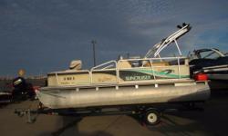 Just arrived to our lot is the 1999 Suncruiser Malibu 181 by Lowe Boats! This previously enjoyed pontoon boat is the perfect starter boat for the budding water enthusiast on a budget! At only 18 feet long, it's easy to tow to the boat ramp. Plus, it's