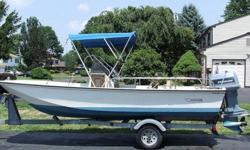 Boston Whaler 17 Montauk in very good condition. Has some small nicks and some spider cracks in gelcoat but hull is solid and dry. Floor and transom firm. Self bailing, foam filled fiberglass hull. Fresh coat of bottom paint. Reversible seat, front anchor