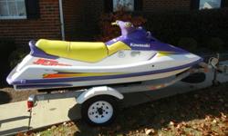 1996 Kawasaki sts750 3 seater 2stroke jetski with reverse. Ski has a 2006 Shorelandr galvenized trailer with a new winch and 12 inch tires. Ski has a new battery and runs. Ski has dings and scratches on the ski, but overall it is in pretty good condition.