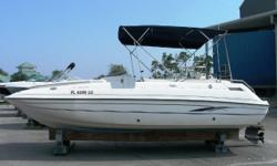 2000 Harris/Kayot 226 Super deck powered by a Volvo 5.0 GL. The large and open layout of the super deck will make a day on the water with friend fun for all. This deck boat is set up with a large bimini top, depth gauge, stereo CD, large forward bow