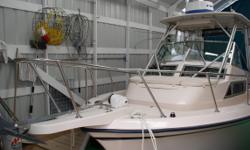 Well maintained Grady White Sailfish.
Accomodations:
V-Berth forward with storage under. Aft is single berth athwartship. Compact galley with sink and one burner range. Ample storage. Enclosed head with stand up sink/shower, headroom 6'4".
"The Sailfish