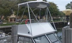 2000 ISLAND HOPPER DIVE BOAT. Powered by a Volvo Turbo Diesel engine that has just had a complete service. Boat is 30' with a 12' beam. Boat has new batteries and new steering system. This boat has 30 dive tank holders, huge dive ladder, and room for